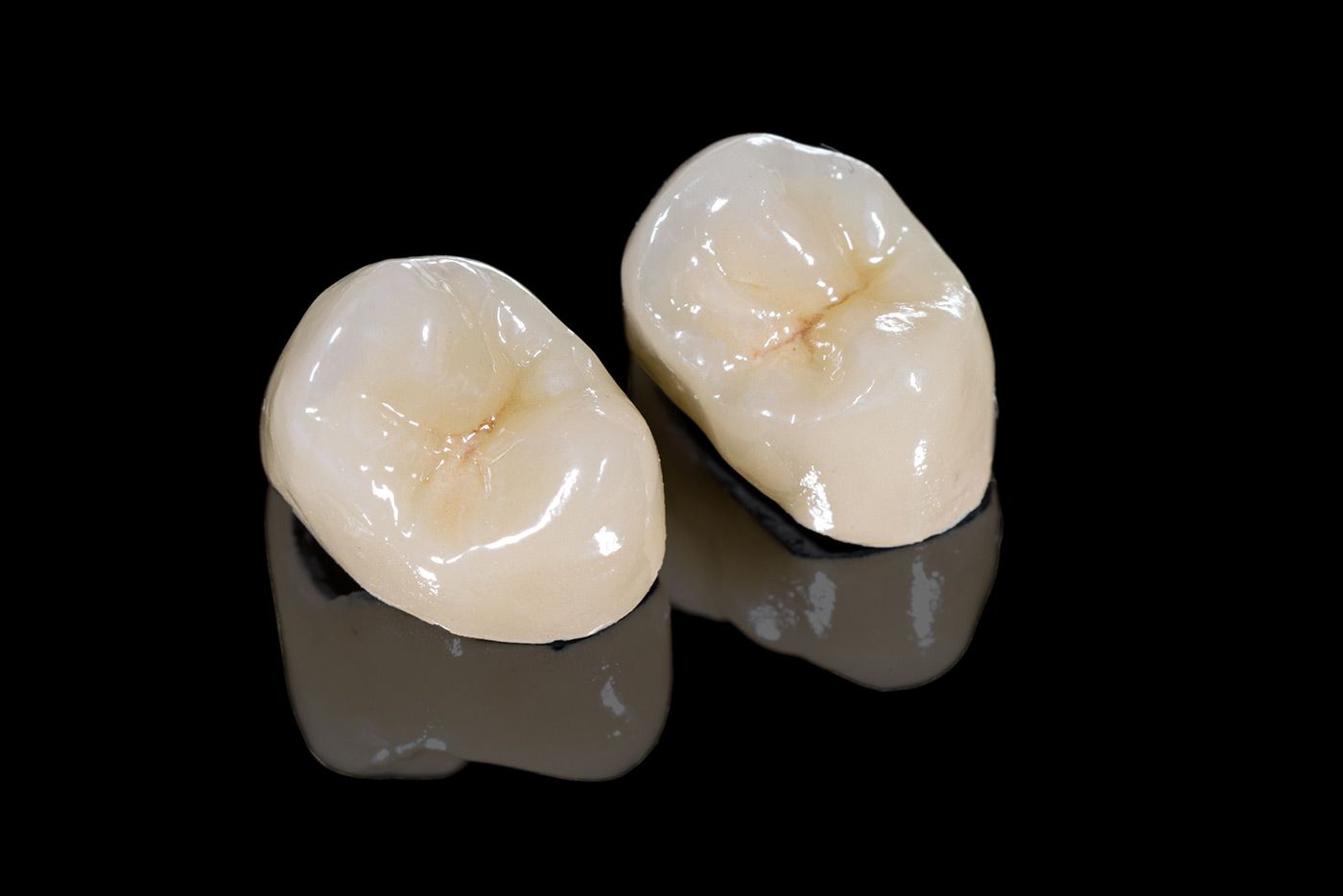 Closeup of two dental crowns